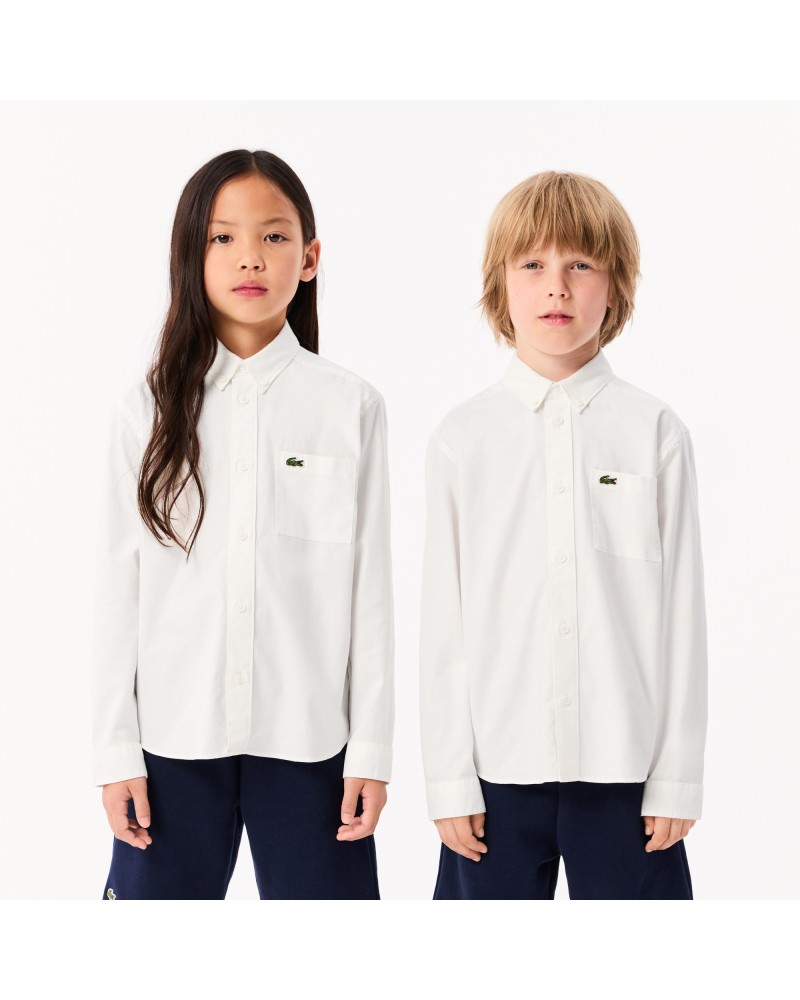 Chemise enfant Lacoste avec poches contrastées sur le devant