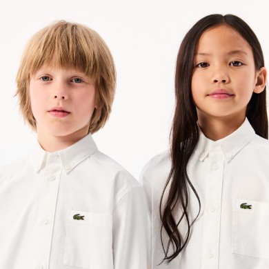 Chemise enfant Lacoste avec poches contrastées sur le devant