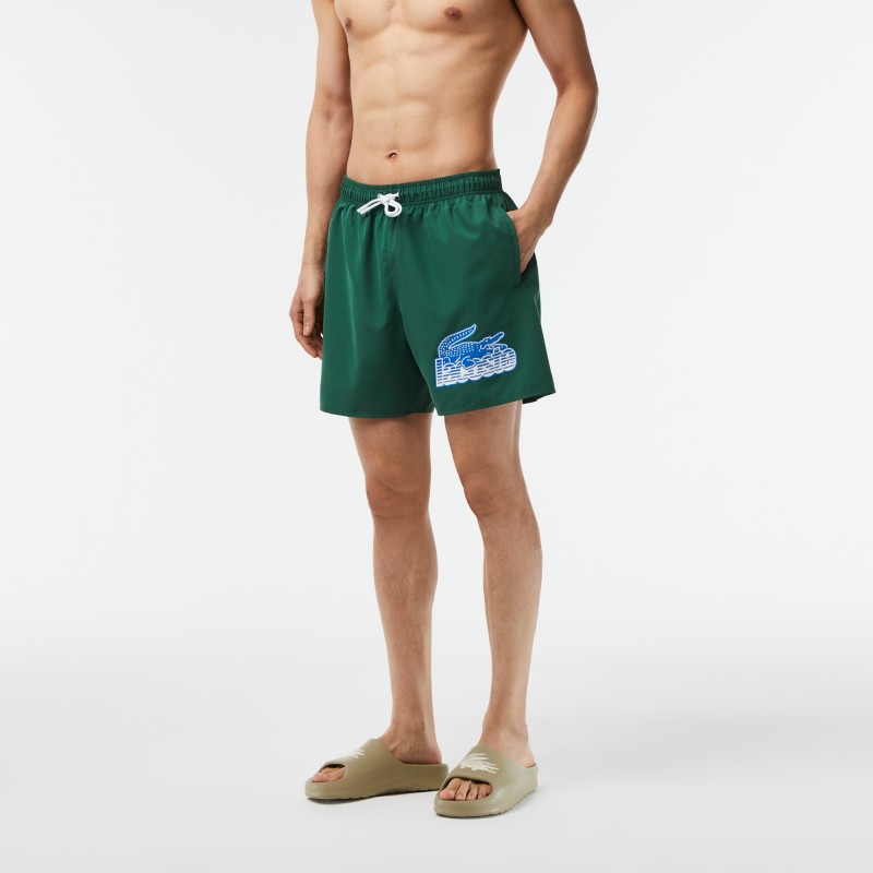 Short de bain homme Lacoste quick dry avec son sac de voyage