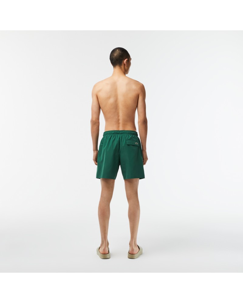 Short de bain homme Lacoste quick dry avec son sac de voyage