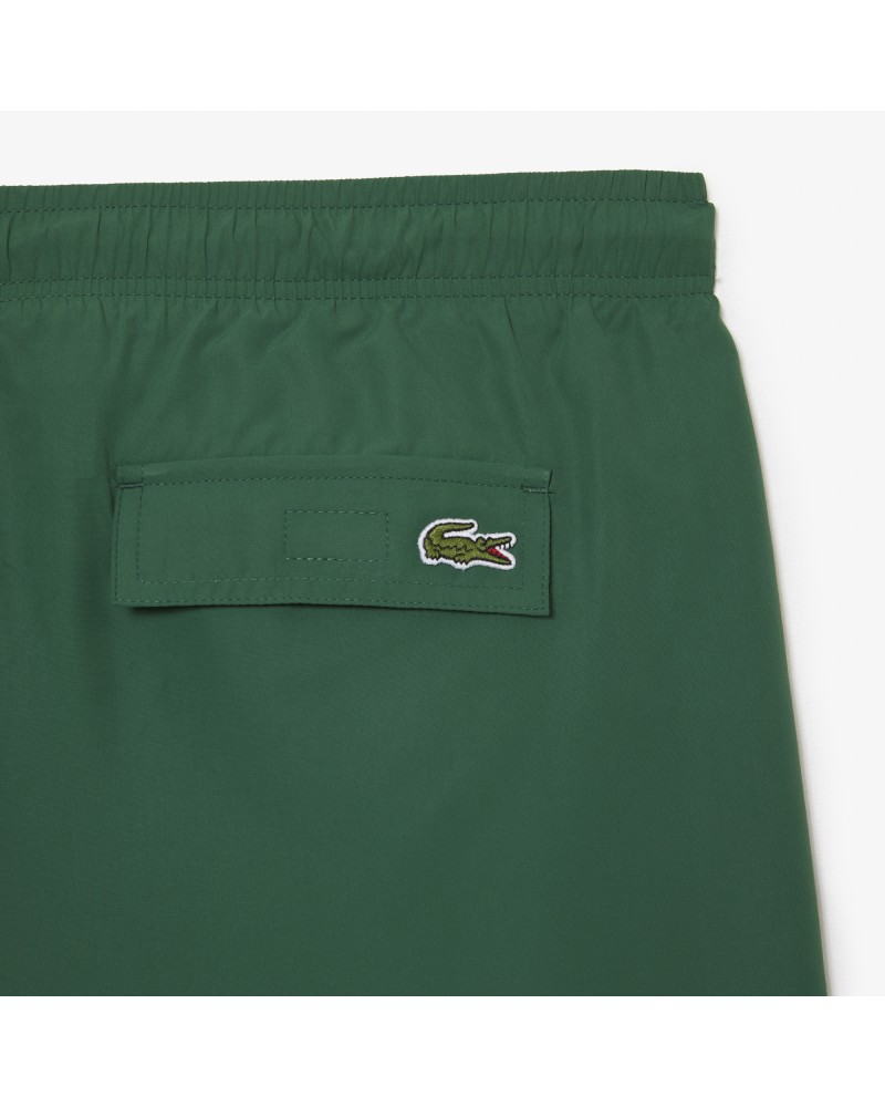 Short de bain homme Lacoste quick dry avec son sac de voyage