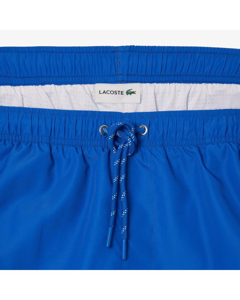 Short de bain long imprimé Lacoste